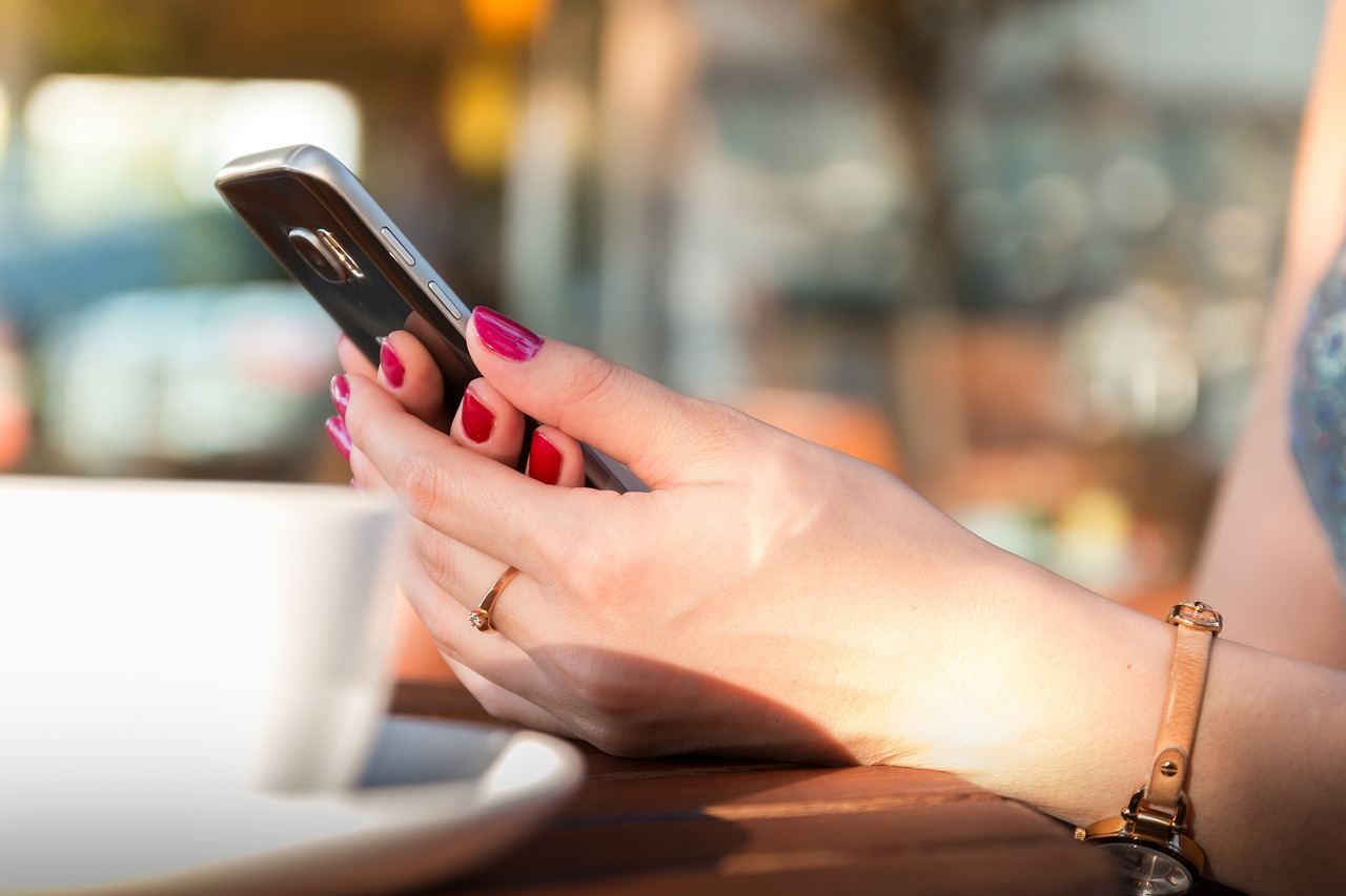 woman holding mobile